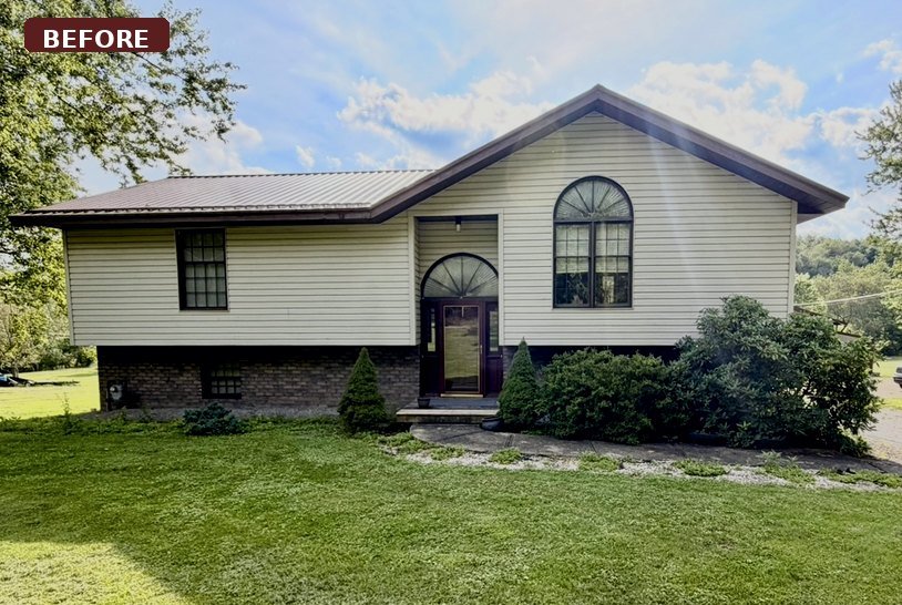 The same house before service, with overgrown foundation shrubs